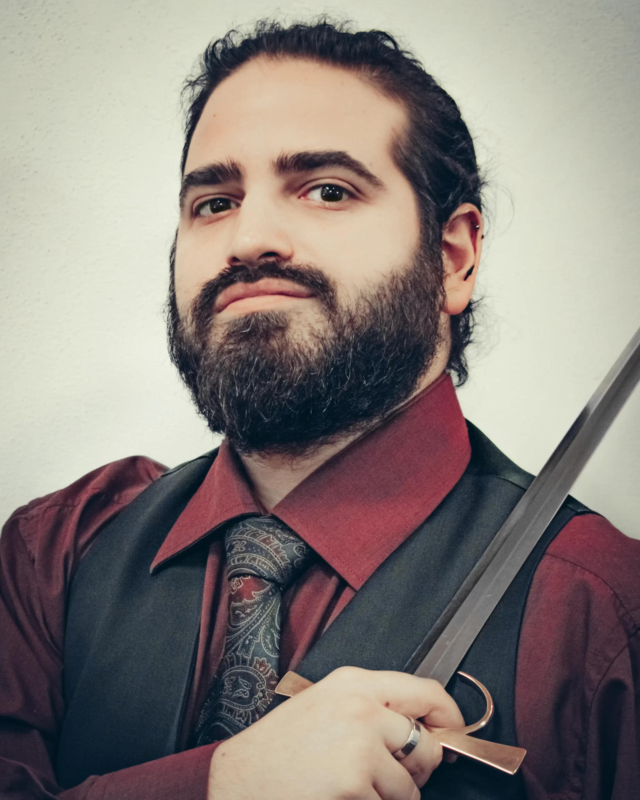 Simone holding his sword