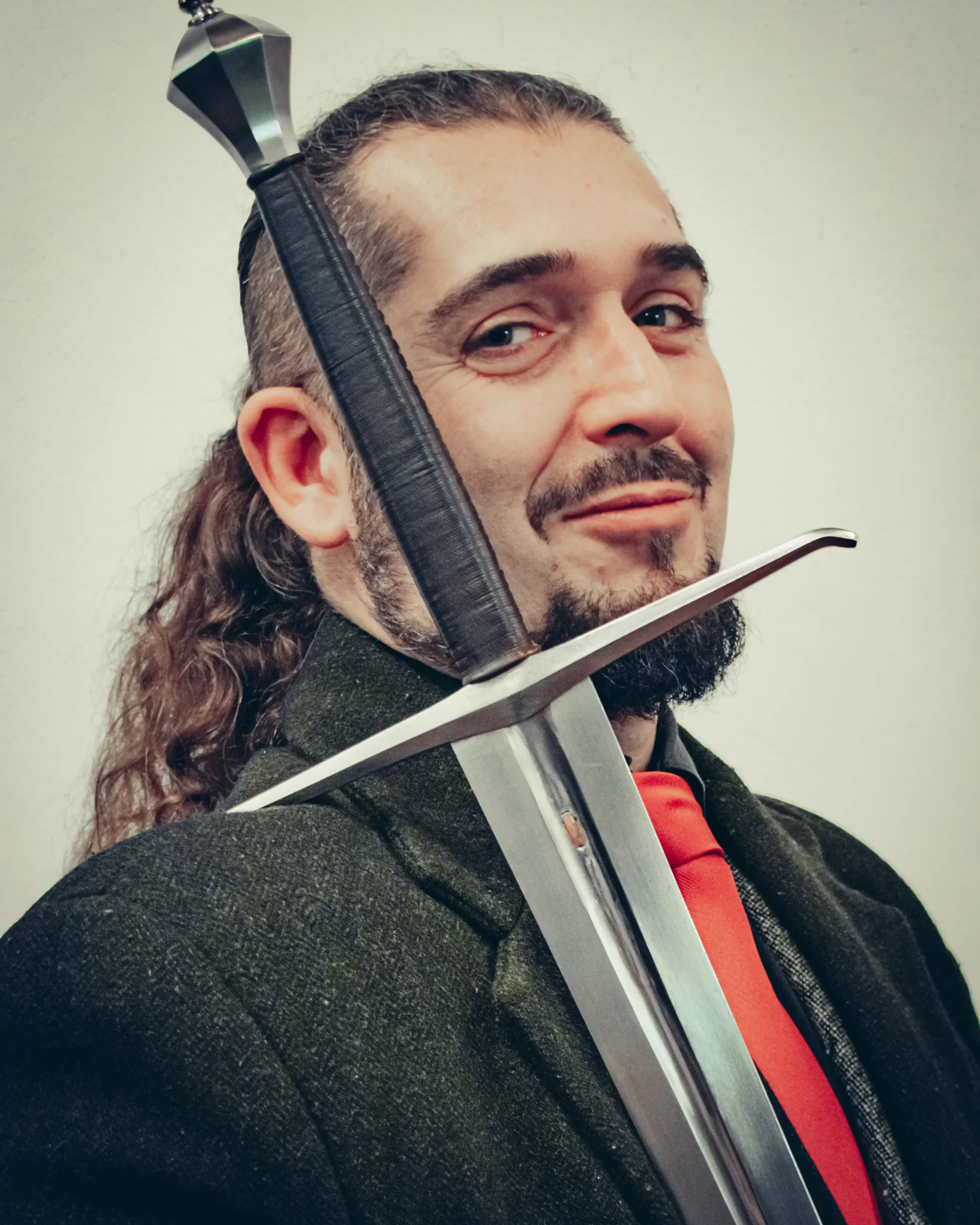 Rodolfo with a sword